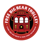 A digital logo for the Free Big Bear Trolley, the trolley is red and facing the viewer.
