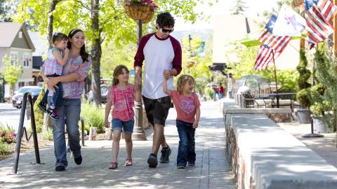 Family walking in the Big Bear Village