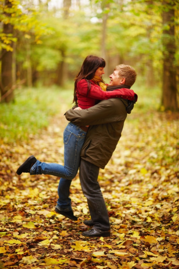 A couple enjoys a hug on a fall day in Big Bear