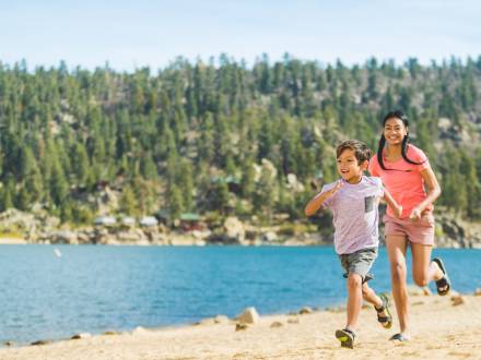 Kids running on a beach